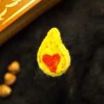 Broche  cœur en flamme