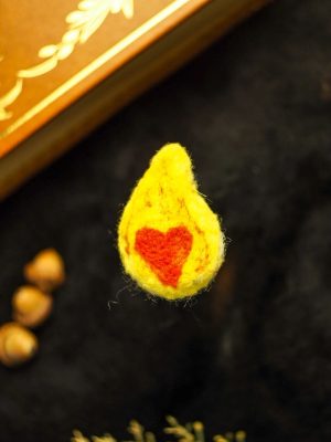 Broche cœur en flamme